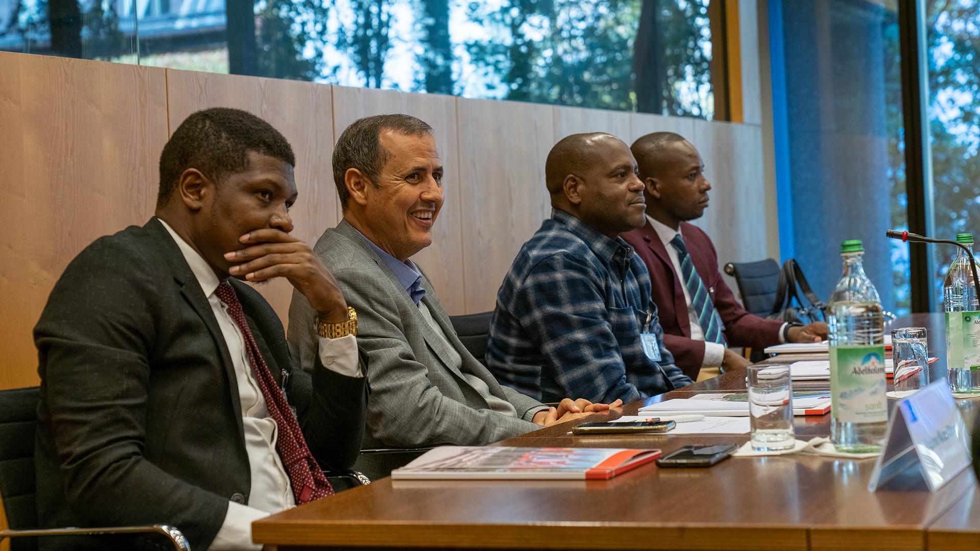 4 persons in the meeting room